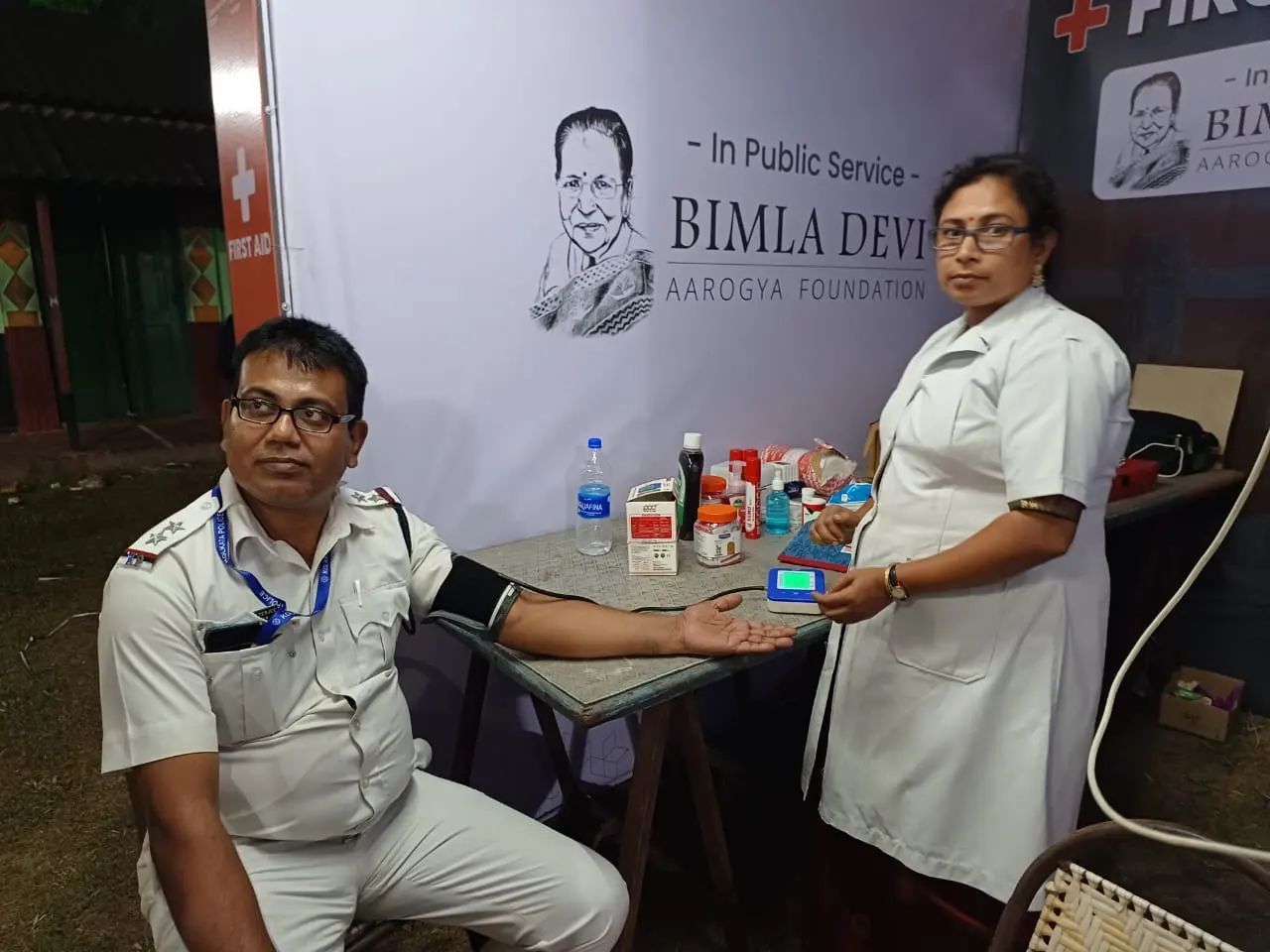 An officer on duty having his blood pressure checked